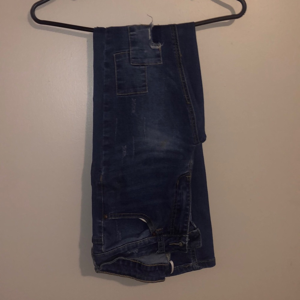 women’s denim jeans with pocket design down front legged area